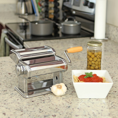 NORPRO® Pasta Machine - Make fresh pasta at home with this chrome plated steel pasta machine with nickel plated steel rollers.  Hand crank machine clamps securely to most any table or countertop to cut lasagna, fettucine and tagliolini pasta. Instruction booklet and recipes included.
